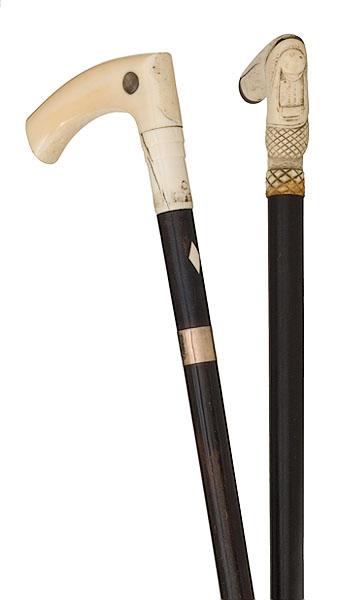 Appraisal: TWO IVORY AND BONE-HANDLED CANES American or English Two ivory