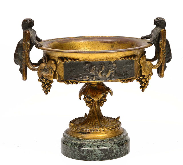 Appraisal: A TH CENTURY GILT BRONZE URN with leopard handles to