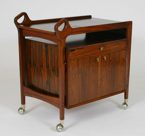 Appraisal: Danish Modern rosewood serving cart by Dyrland two doors one