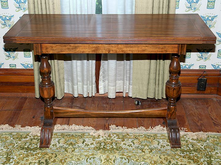 Appraisal: Library Table A s twist top table in fine condition