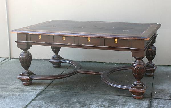 Appraisal: A Neoclassical style walnut library table