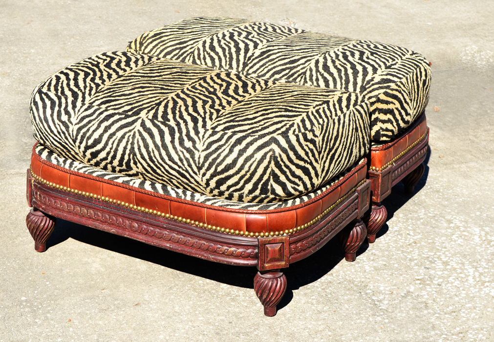 Appraisal: PAIR LARRY LASLO FOR DIRECTIONAL OTTOMANS Zebra pattern upholstery over