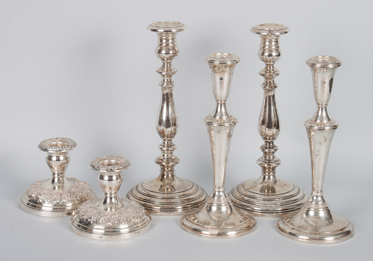 Appraisal: Three pairs of weighted sterling candlesticks pair of Gorham pattern