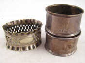 Appraisal: A pair of silver napkin rings London and a plated