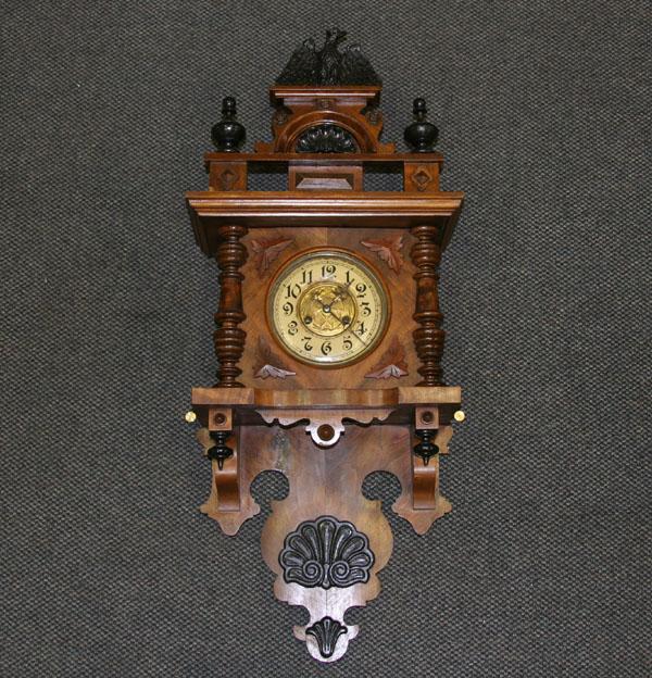 Appraisal: Key wind wall clock solid walnut and book match veneered