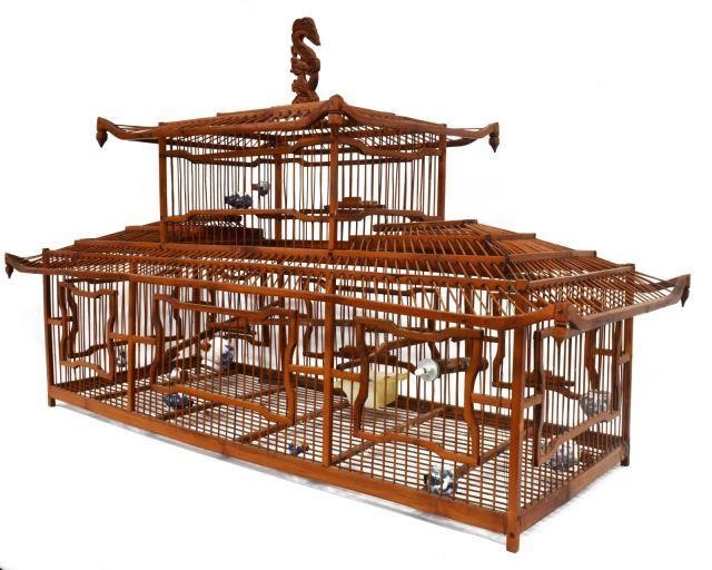 Appraisal: Chinese pagoda-style bird cage having architectural form accompanied by diminutive