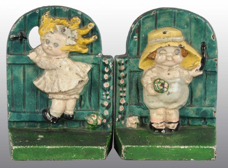 Appraisal: Cast Iron Children at Gate Bookends Description Children at Gate