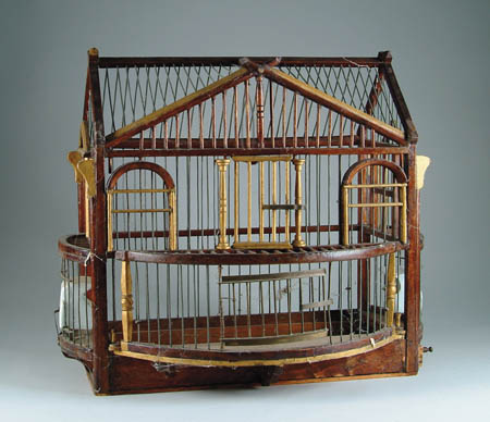 Appraisal: WIRE AND WOOD BIRD CAGE Bow front two tier house