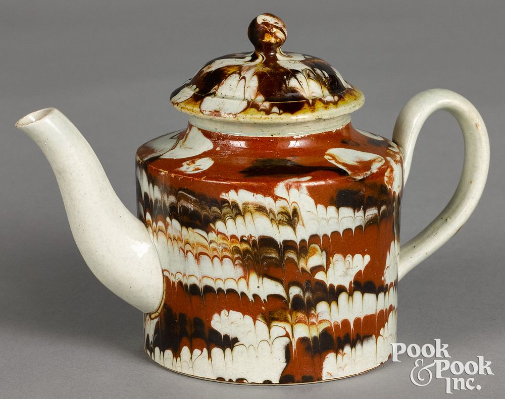 Appraisal: Small mocha teapot with marbleized glaze Small mocha teapot with