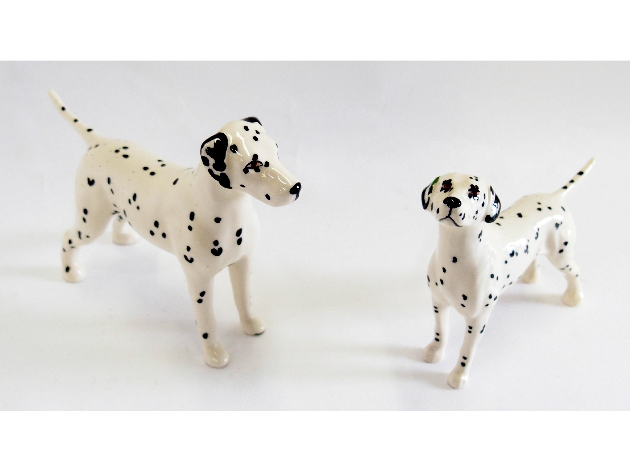 Appraisal: Two Beswick figures of Dalmatians