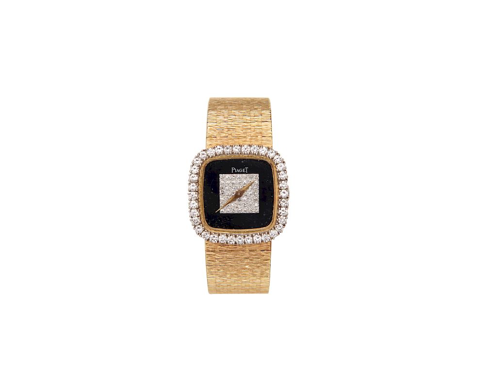 Appraisal: PIAGET K Gold and Diamond Wristwatch PIAGET K Gold and