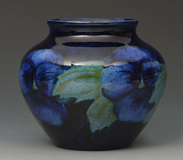 Appraisal: William Moorcroft British - 'Blue Pansy' vase circa spainted initials