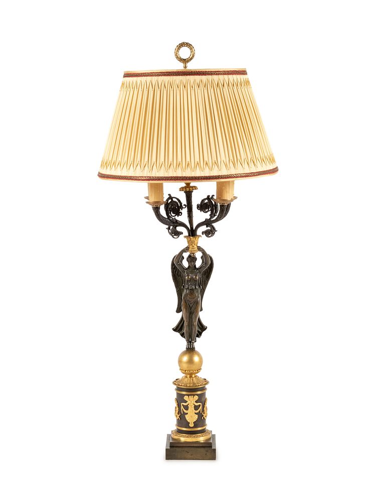 Appraisal: An Empire Style Gilt and Patinated Bronze Figural Five-Light Candelabrum