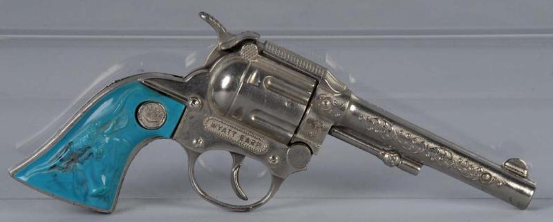 Appraisal: Wyatt Earp Cap Gun Description Turquoise grips Works well When