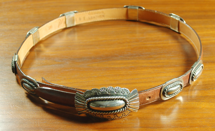 Appraisal: AREIAS STERLING SILVER AND LEATHER BELT adorned with Southwest style