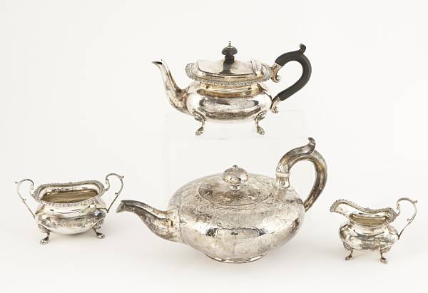 Appraisal: A Victorian silver teapot with Edwardian Silver and Wood Bachelor's