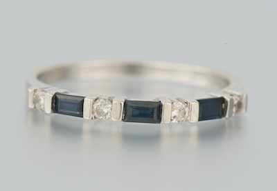 Appraisal: A Ladies' Diamond and Sapphire Band k white gold band