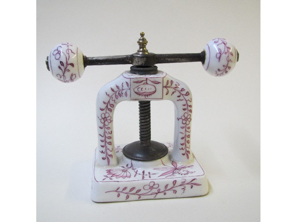 Appraisal: A Paris porcelain nut cracker press printed en cameio rose