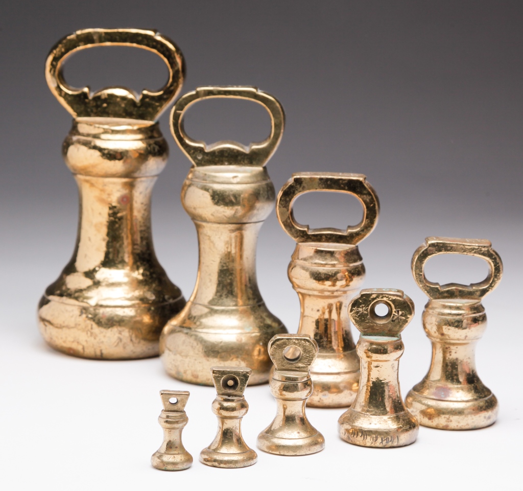 Appraisal: EIGHT AMERICAN BRASS WEIGHTS Nineteenth century Set of brass lead