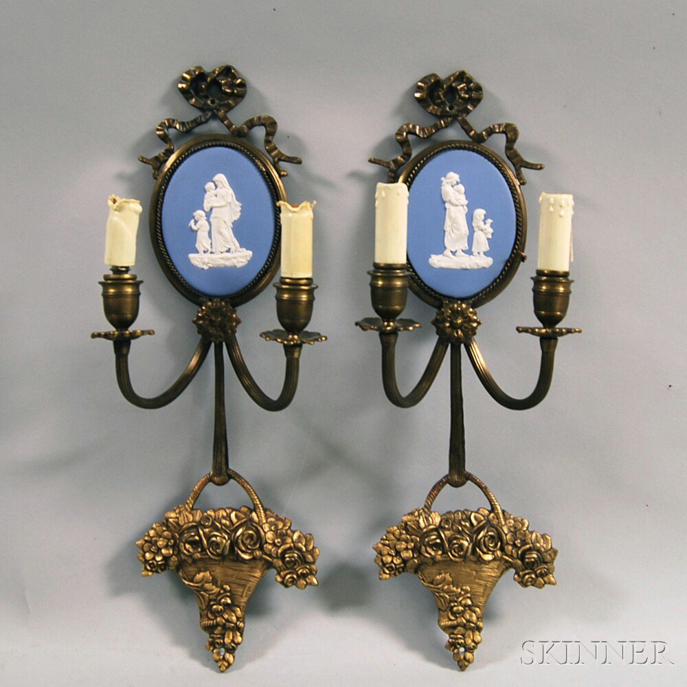 Appraisal: Pair of Wedgwood Metal-mounted Two-light Wall Sconces with ribbon cresting