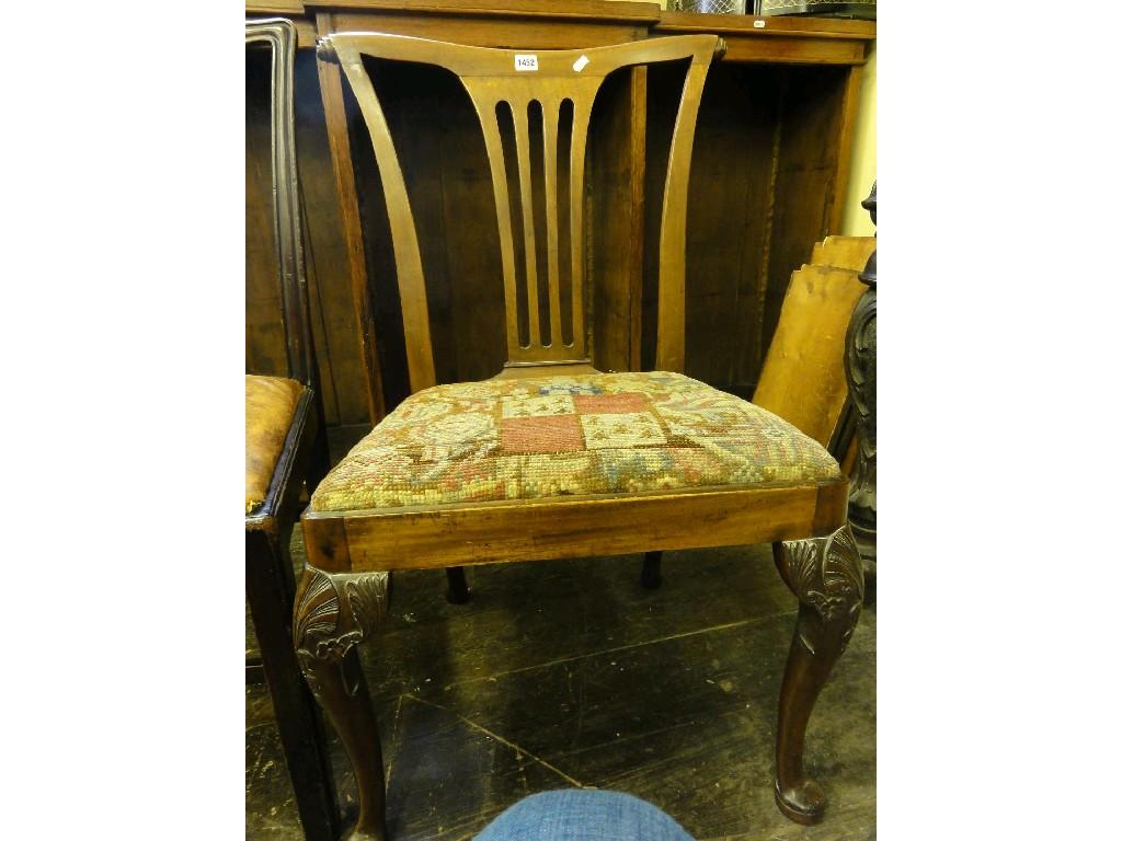 Appraisal: A Georgian mahogany single chair the raised back with scrolled