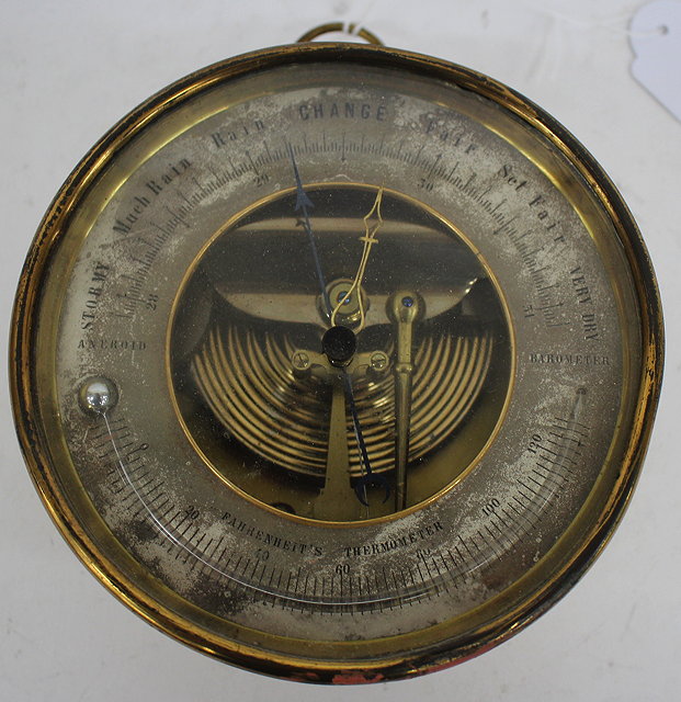 Appraisal: A TH CENTURY LACQUERED BRASS CIRCULAR WALL HANGING BAROMETER AND