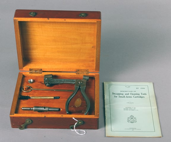 Appraisal: US Decapping and Cleaning Tool Outfit in wood chest with