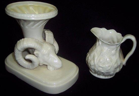 Appraisal: A Belleek spill vase modelled as a horn issuing from