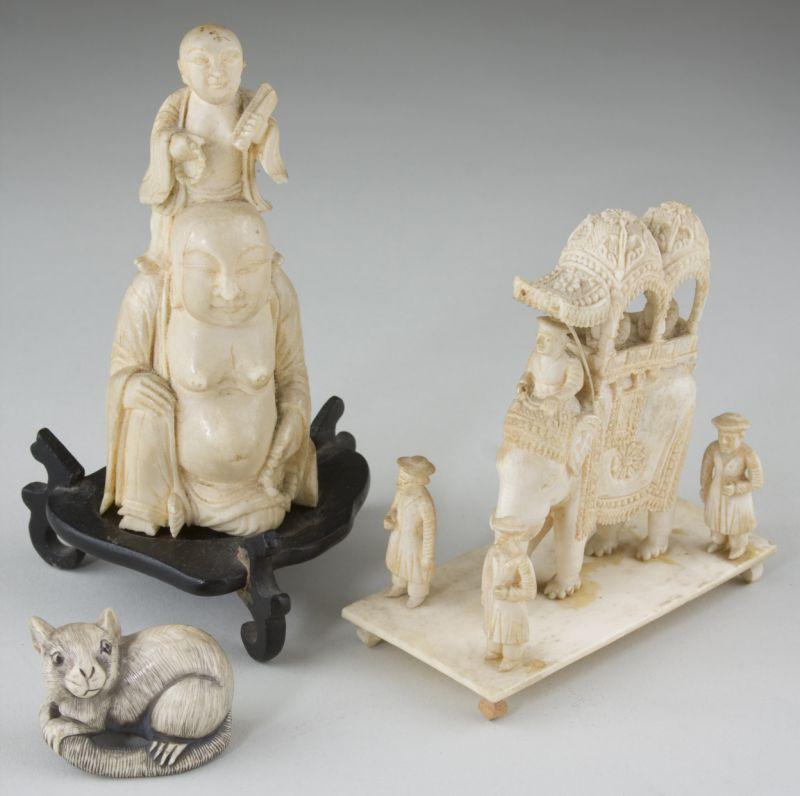 Appraisal: Three Asian Ivory Carvings the first being a seated Buddha