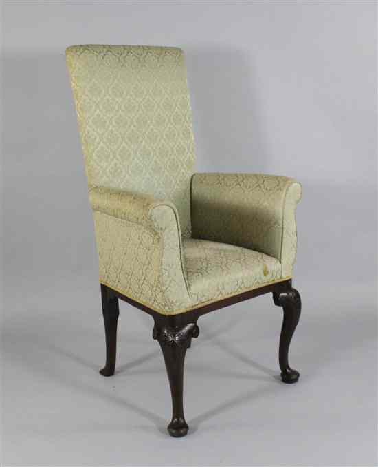 Appraisal: A George II carved mahogany armchair with leaf carved knees