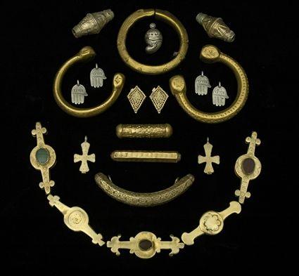 Appraisal: Assorted African Gilt-Bronze Bracelets Together with Middle Eastern pendants and