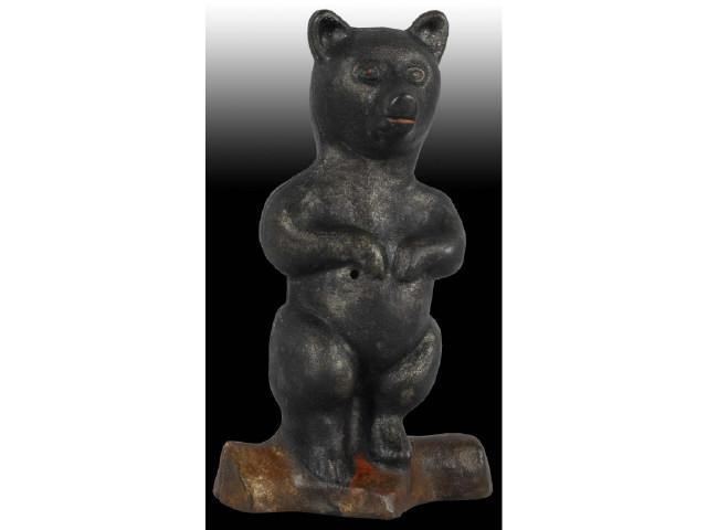 Appraisal: Cast Iron Bear Seated on Log Still Bank Description Made