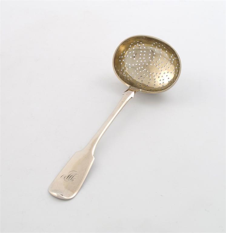 Appraisal: A th century Russian silver Fiddle pattern sifting spoon