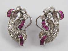 Appraisal: A pair of platinum ruby and diamond clip earrings circa