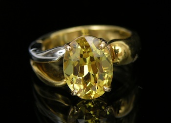 Appraisal: A Two-Tone Gold Ring with Topaz k yellow and white