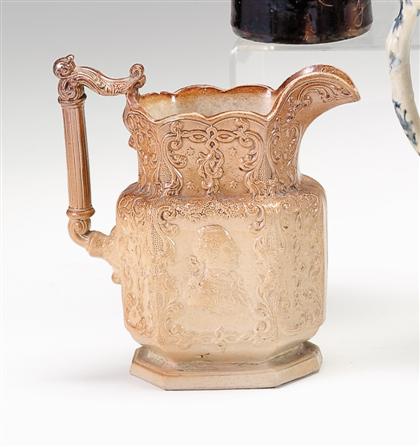 Appraisal: Glazed and molded stoneware pitcher first half of th century