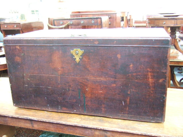 Appraisal: A th century mahogany coffer with brass loop handles and