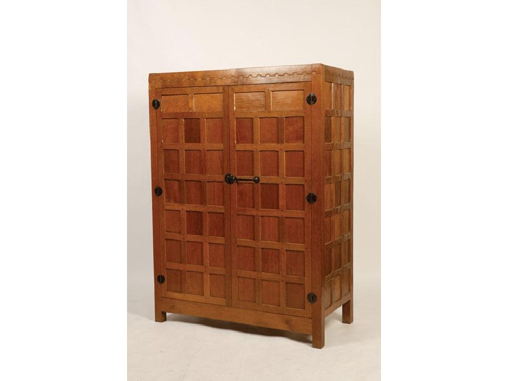 Appraisal: MOUSEMAN ROBERT THOMPSON OF KILBURN AN OAK WARDROBE with multi