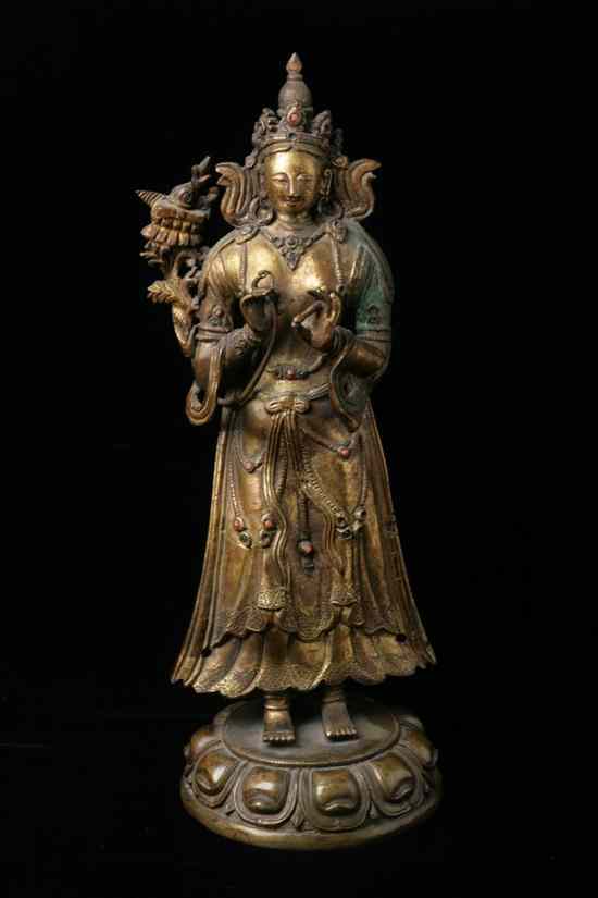 Appraisal: TIBETO-CHINESE GILT BRONZE FIGURE OF MANJUSHRI th century The figure