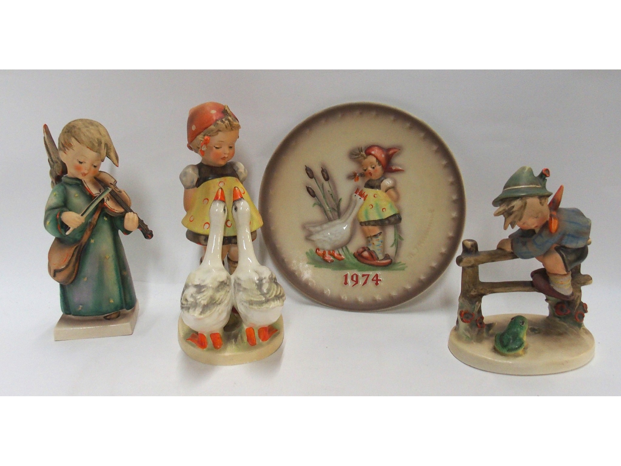 Appraisal: Three Hummel figures to include a large Goose Girl no