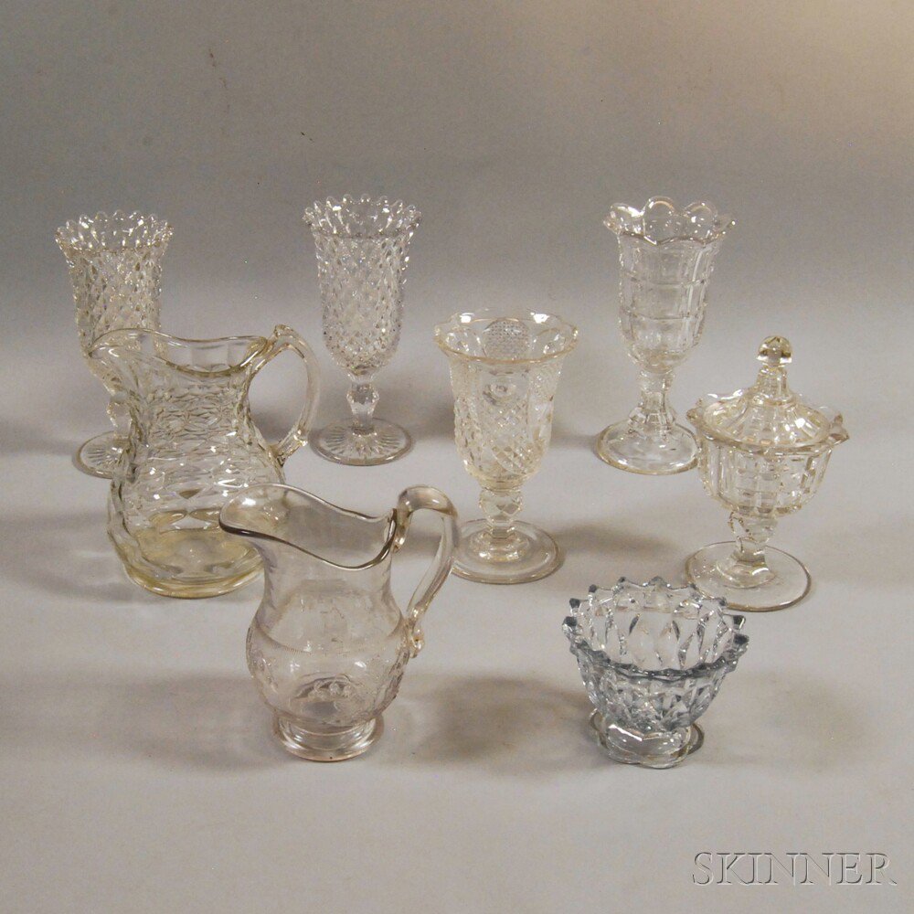 Appraisal: Eight Colorless Glass Vessels America th century four celery vases