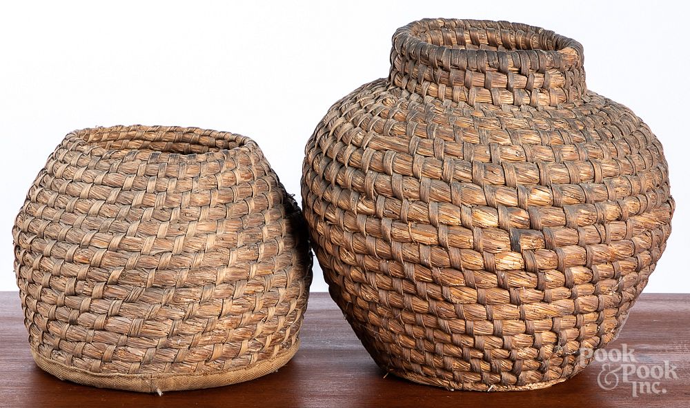 Appraisal: Two Pennsylvania rye straw baskets th c Two Pennsylvania rye