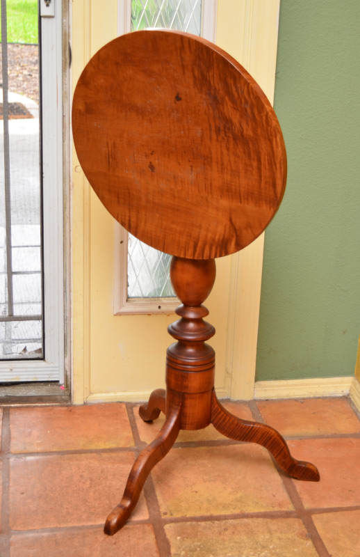 Appraisal: TIGER MAPLE TILT TOP OCCASIONAL TABLE Round tilt top turned