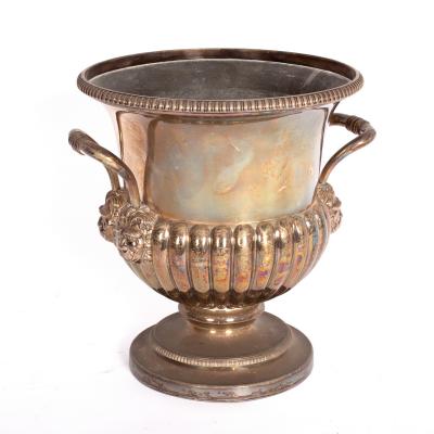 Appraisal: A lobed Sheffield plate wine cooler urn shaped the handles