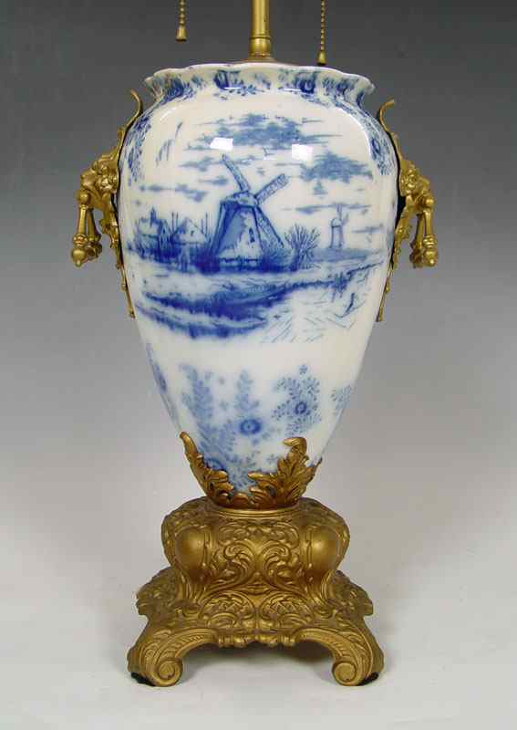 Appraisal: DELFT STYLE TABLE LAMP Blue and white decoration with house