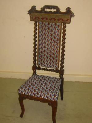 Appraisal: A VICTORIAN ROSEWOOD NURSING CHAIR upholstered in geometric beadwork covering