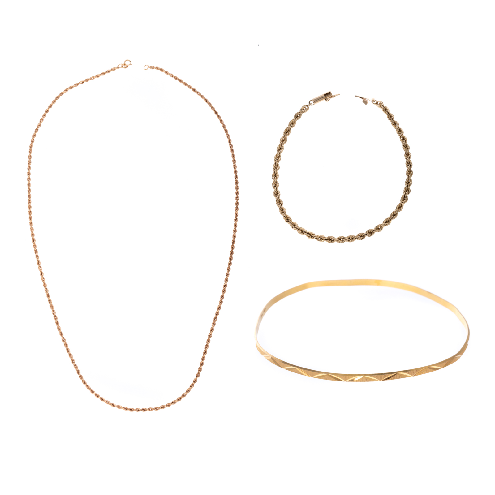 Appraisal: AN ASSORTMENT OF K CHAINS BANGLES K rose gold rope