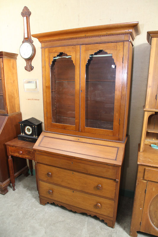 Appraisal: TWO PIECE SECRETARY BOOKCASE Walnut with a thumb molded cornice