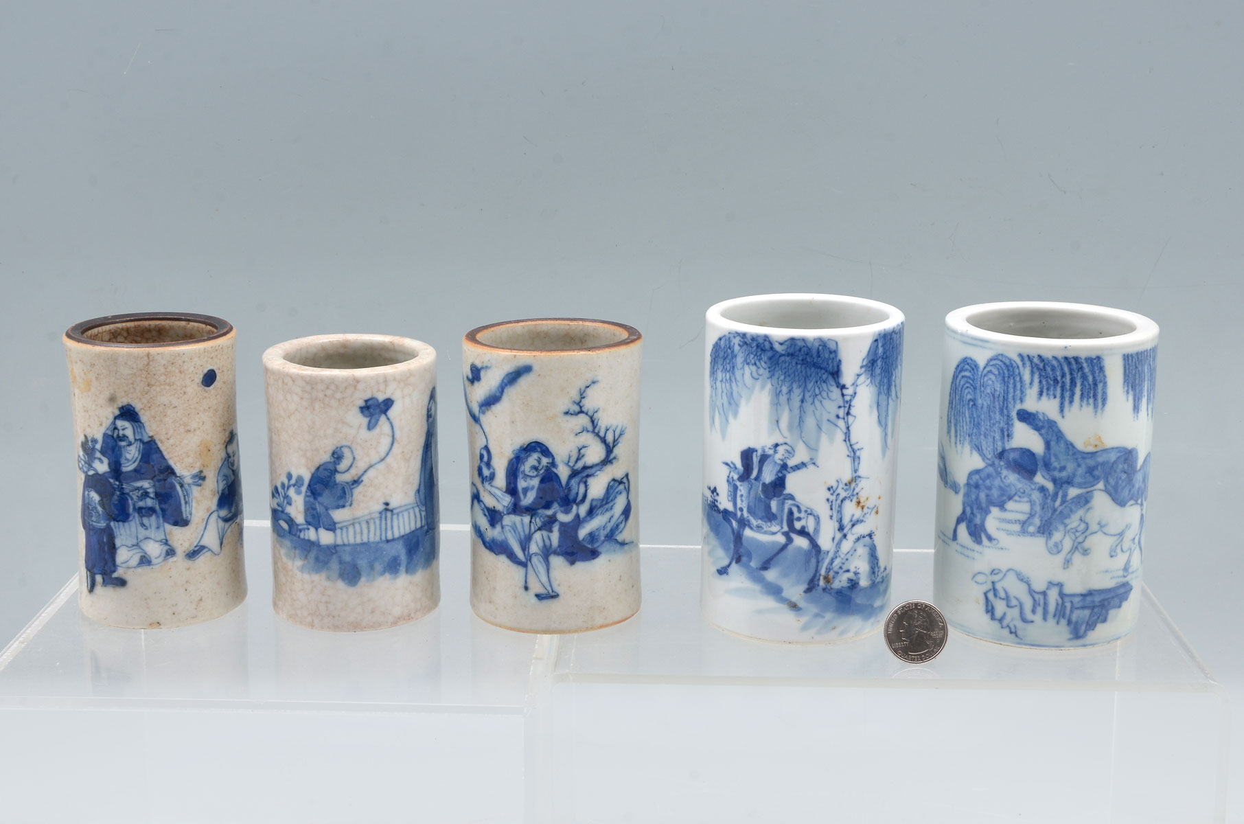 Appraisal: CHINESE FIGURAL BLUE WHITE BRUSH POTS - Chinese blue white