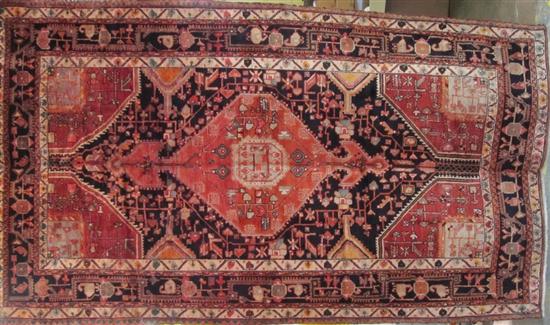 Appraisal: RUG Hamadan rug Red groomed with beige fields ' x